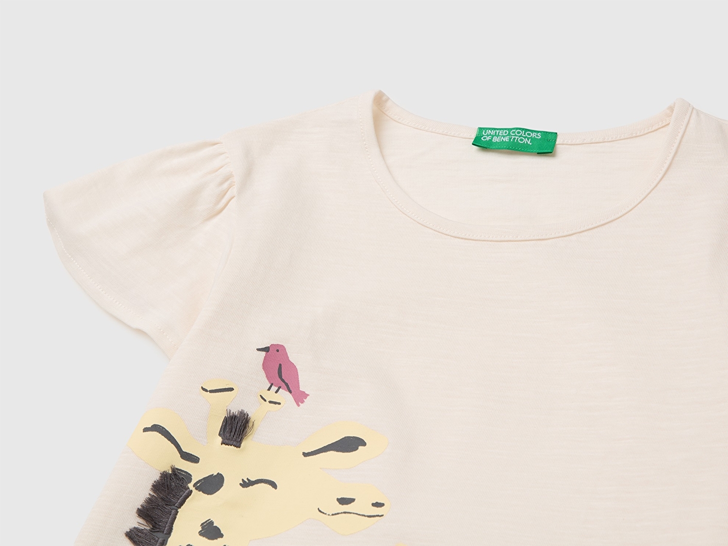 Benetton Kız Bebek Ekru Baskı ve Püskül Detaylı Regular Fit T-Shirt

