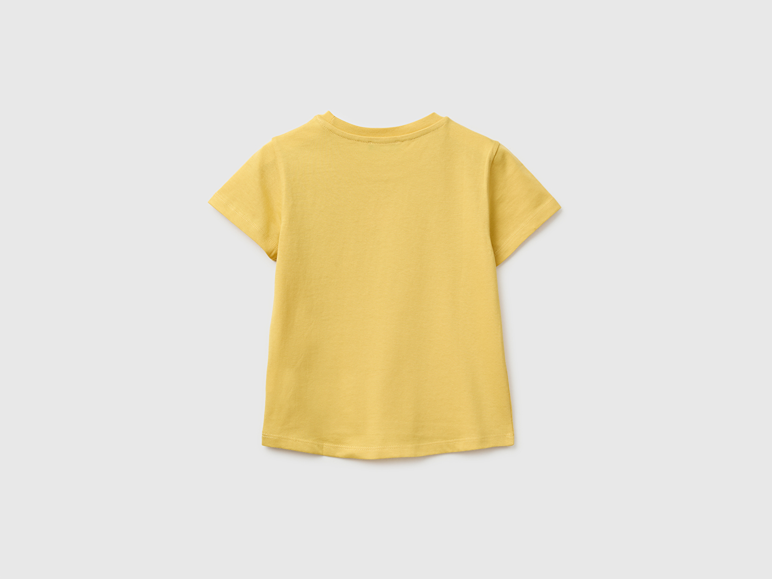 Benetton Kız Bebek Hardal Sarısı Baskı ve İşleme Detaylı Asimetrik Etekli T-Shirt