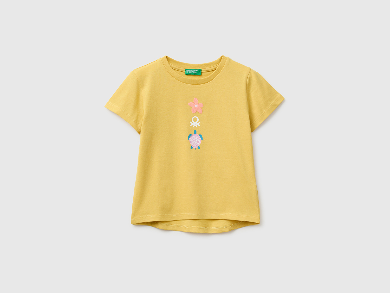 Benetton Kız Bebek Hardal Sarısı Baskı ve İşleme Detaylı Asimetrik Etekli T-Shirt