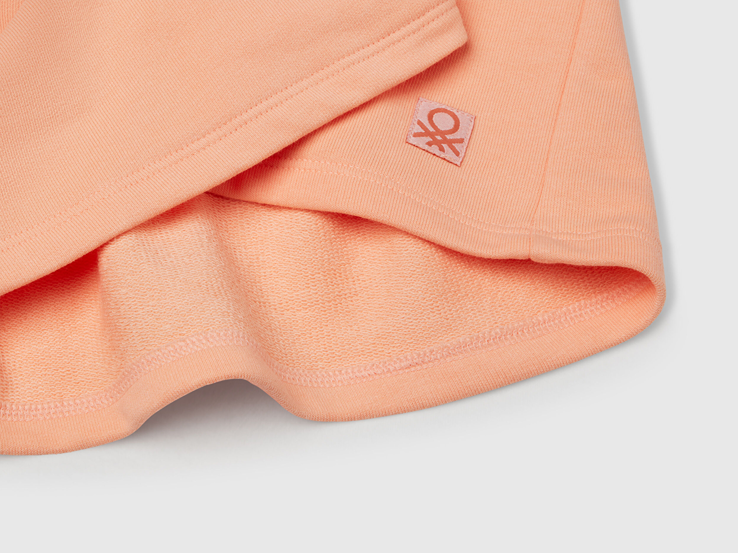 Benetton Kız Çocuk Yavruağzı Logo Etiketli Pileli Bel Bantlı Etek