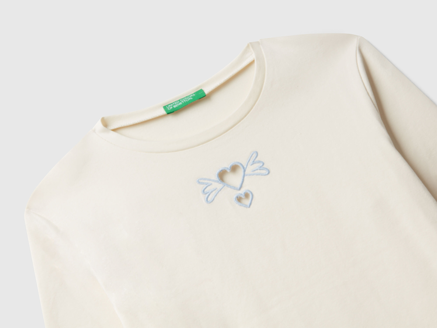 Benetton Kız Çocuk Ekru Önü Baskılı Logo Etiketli Jarse Uzun Kollu T-shirt