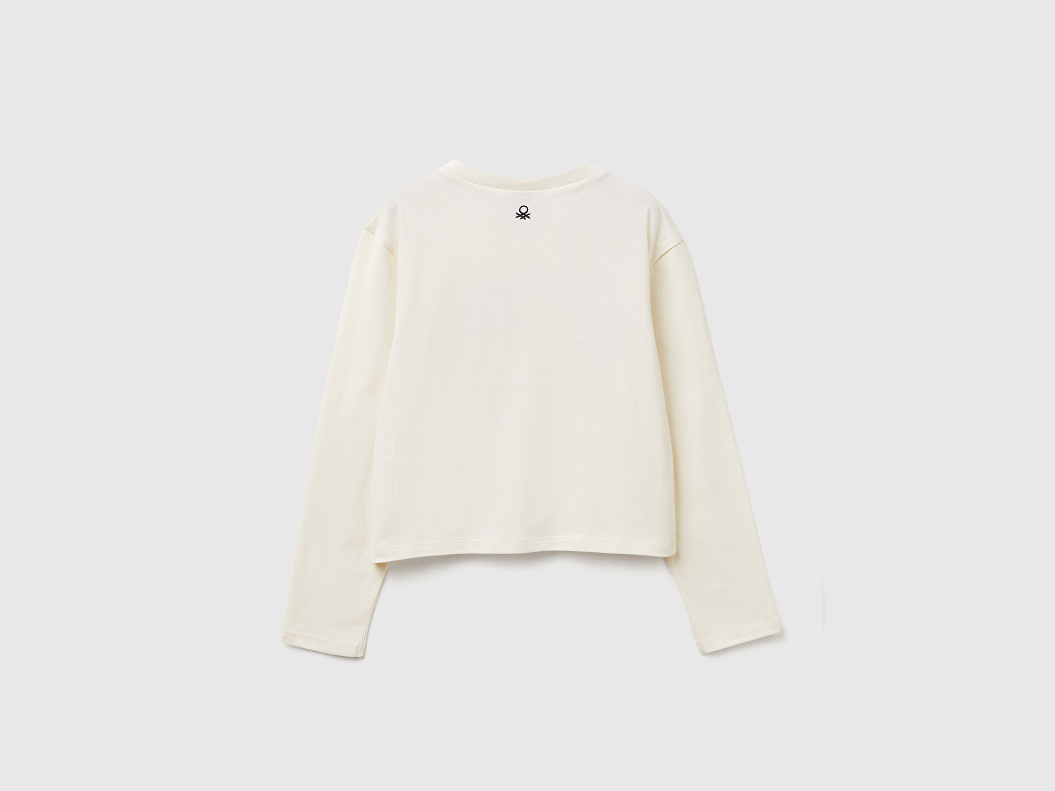 Benetton Kız Çocuk Ekru Önü Simli Baskılı Logo Etiketli Boxy Uzun Kollu T-shirt
