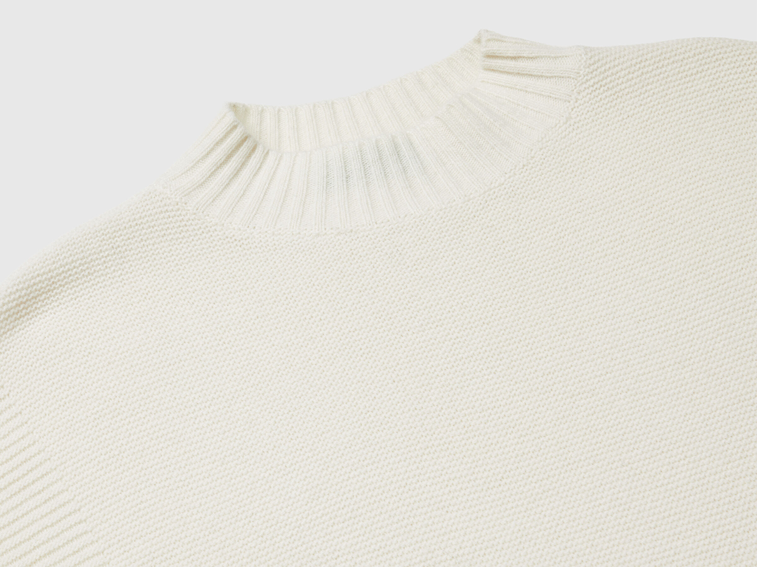 Benetton Kadın Krem Yün Karışımlı Ribana Detaylı Yırtmaçlı Kolsuz Kazak