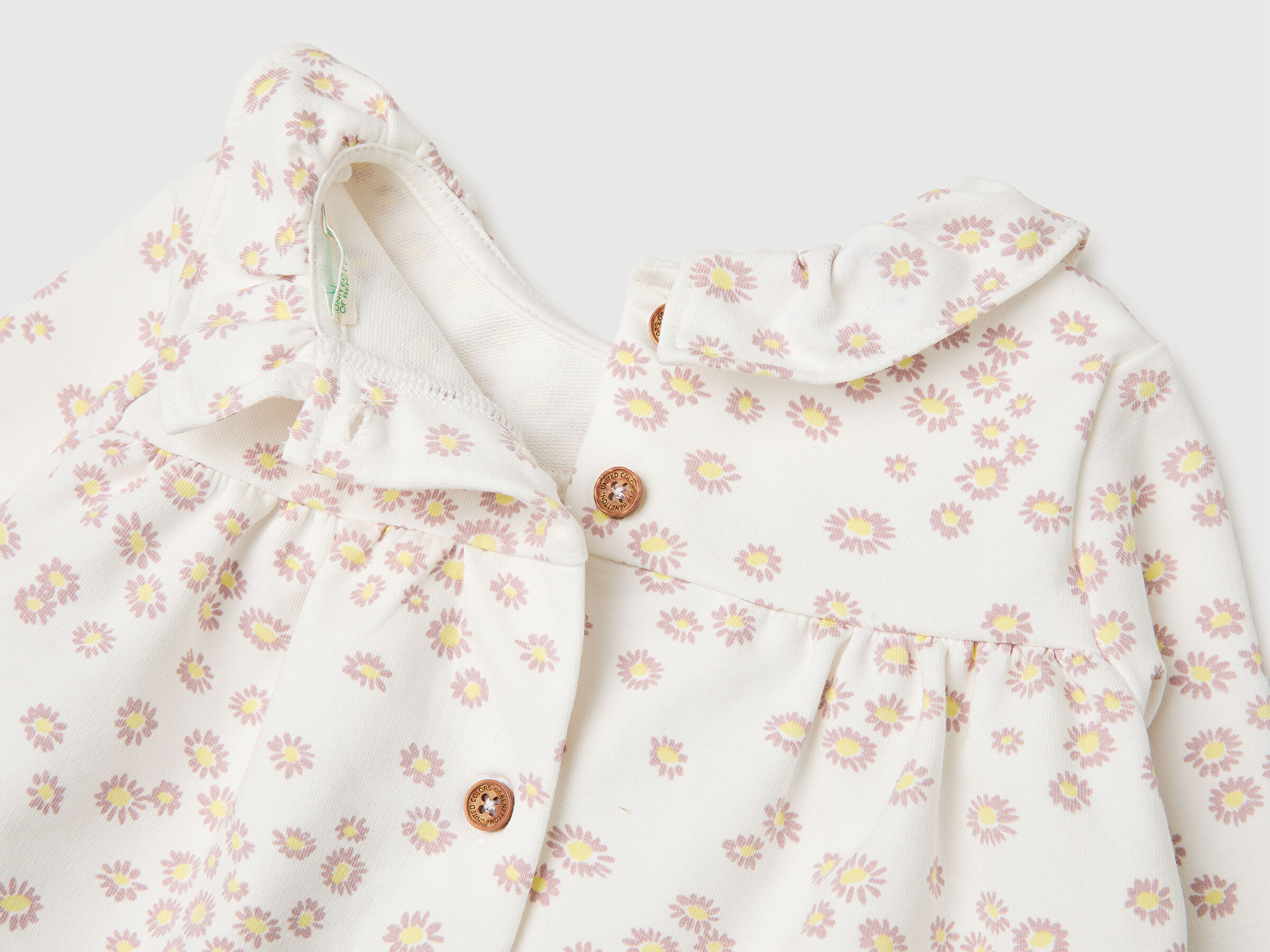 Benetton Bebek Krem Baskılı Arkası Düğmeli Uzun Kollu Fırfırlı Yaka Elbise
