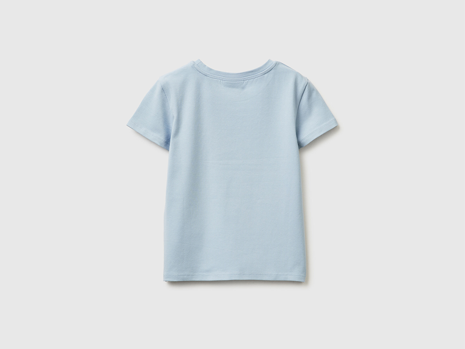 Benetton Kız Çocuk Buz Mavisi Önü Baskılı Etek Ucu Logolu Bisiklet Yaka T-Shirt