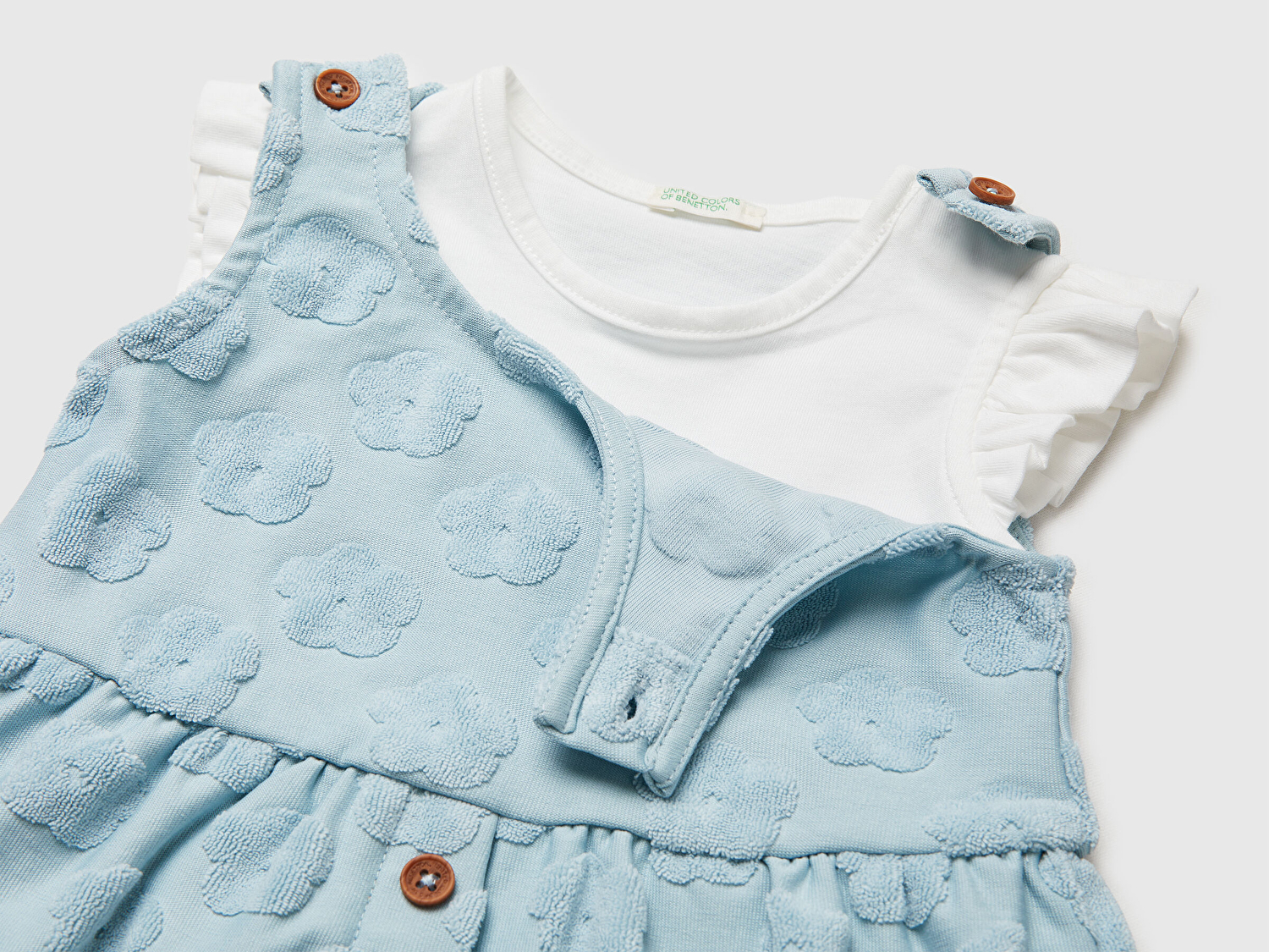 Benetton Bebek Açık Mavi Çiçek Desenli Önden Düğmeli Kolları Fırfırlı Elbise