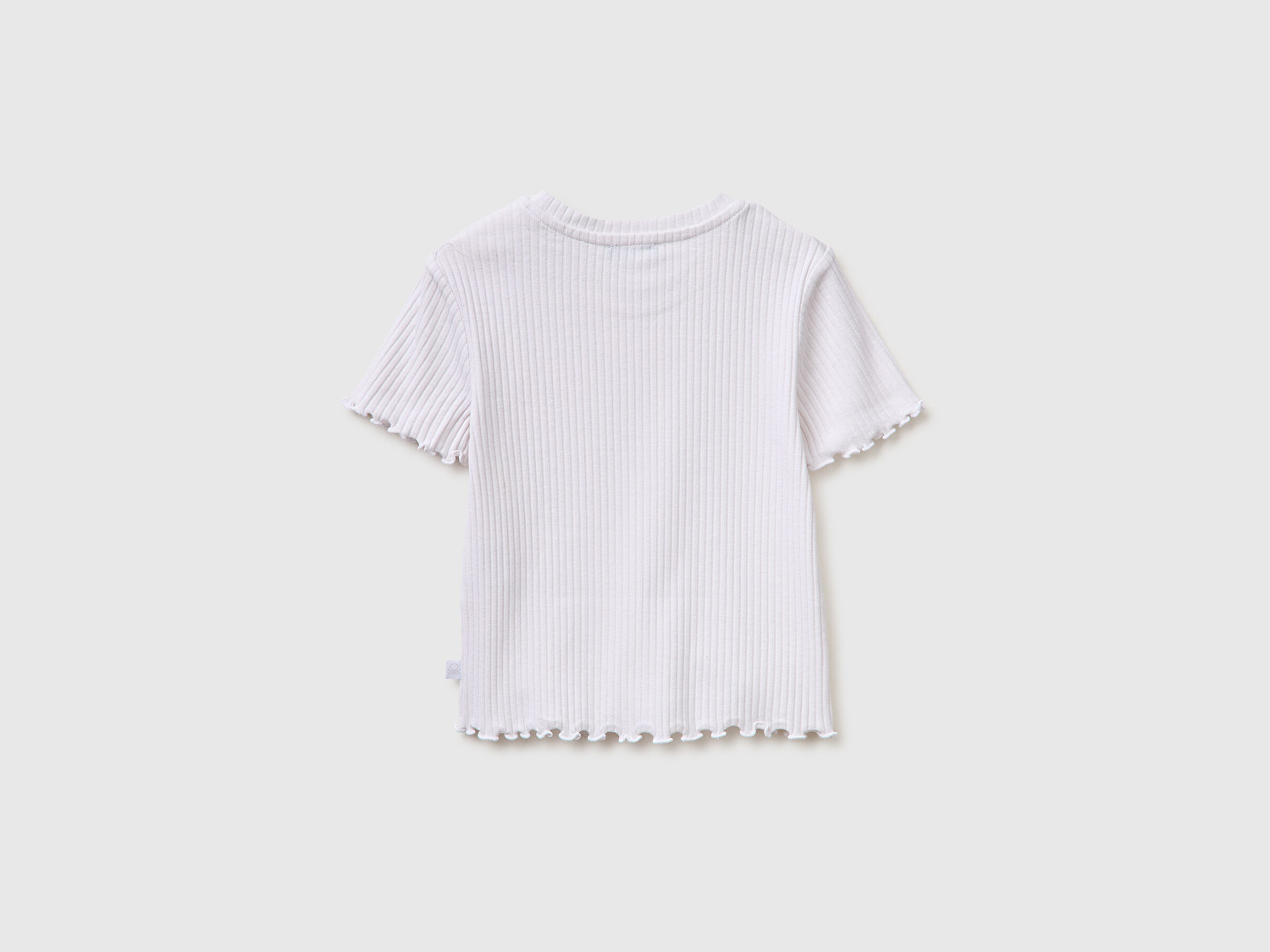 Benetton Kız Çocuk Beyaz Etek Ucu Fırfırlı Bisiklet Yaka Kısa Kollu T-Shirt