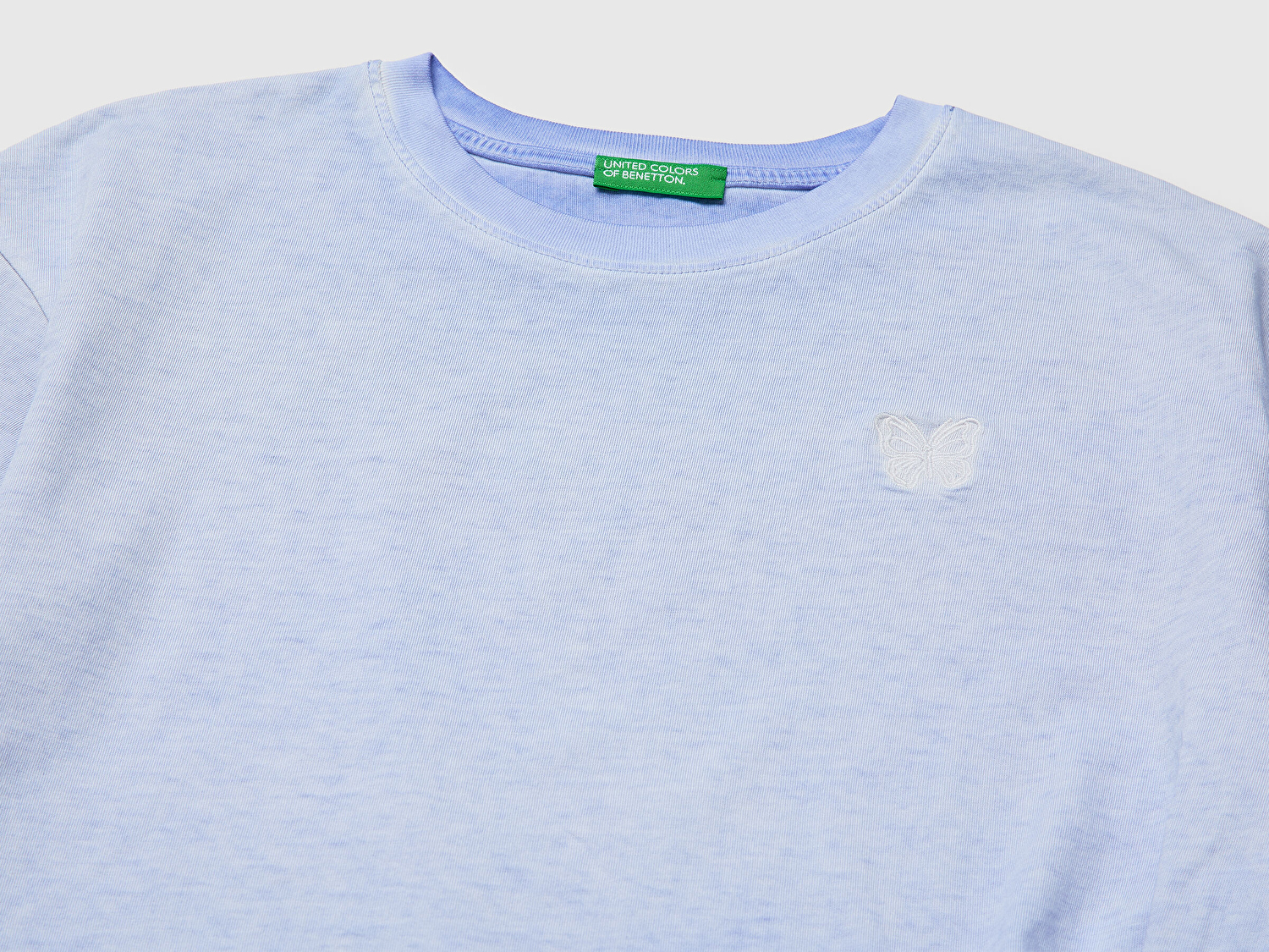 Benetton Kız Çocuk Mavi Etek Ucu Düğümlü Baskılı Boxy Fit Kısa Kollu T-Shirt