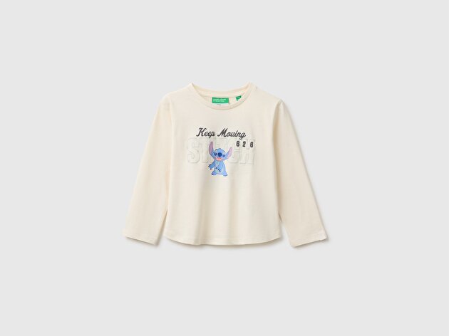 Benetton Kız Bebek Ekru Önü Lilo&Stitch Baskılı Ribanalı Uzun Kollu Tişört