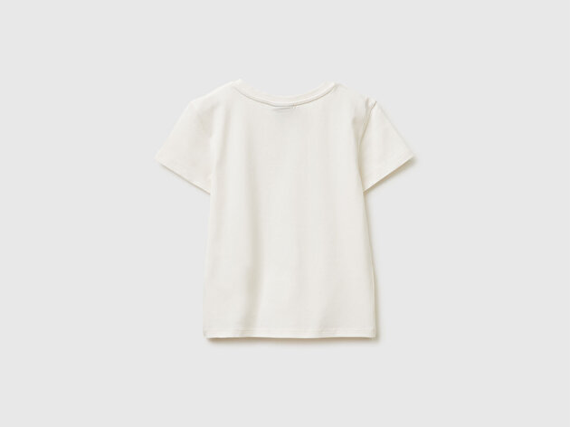 Benetton Kız Çocuk Ekru Önü Baskılı Etek Ucu Logolu Bisiklet Yaka T-Shirt
